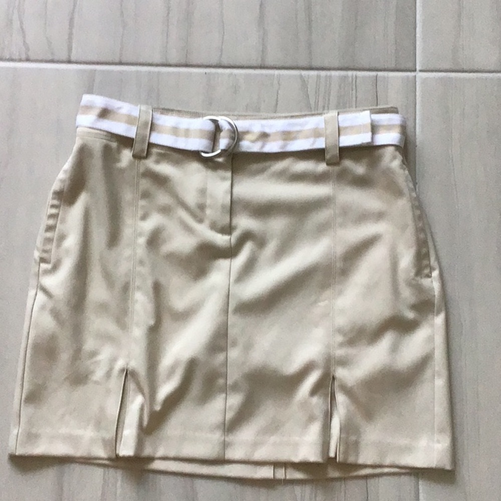 Tan IZOD front zip golf skort.
